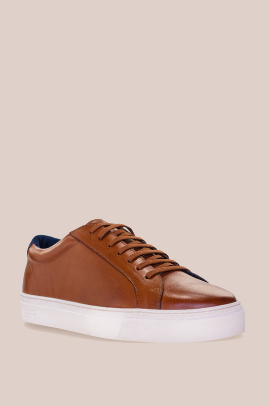 The P22 Smart Sneaker, part of the all-new Cavani X Best collaboration. With its unique sole pattern and smooth design, you're sure to look your best in the P22 Smart Sneaker.   TV personality, famous for his appearances on 'Ex on the Beach', 'Celebrity Big Brother' and so much more.   The Calum Best Range @ www.millscountrystore.com