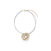 Whirlwind - Crystal and Yellow Gold Swirl Pendant on Silver Leather Adjustable Necklace from Frinkle