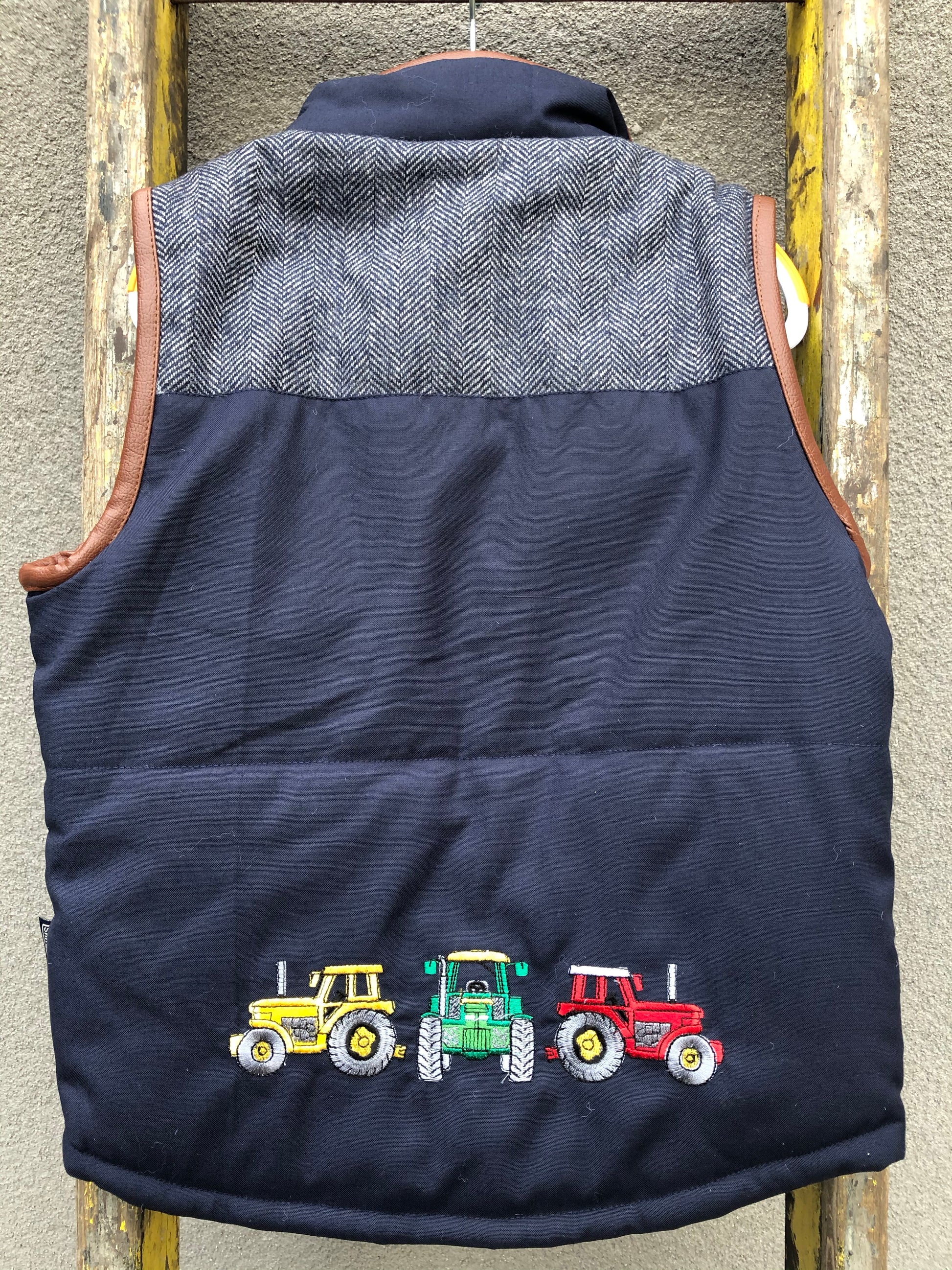 Boys Tractor Tweed Bodywarmer in Navy @ www.millscountrystore.com
